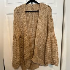 This Cute Free People Cardigan Would Be Cute For Any Occasion. It Is A Size Xs But Could Fit Anyone Up To A Size L. It Is New Without Tags, Never Worn! Open Front Knit Sweater, One Size Open Knit Sweater, Oversized Open Knit V-neck Outerwear, Casual One-size Knit Cardigan, One Size Open Knit Cardigan, One Size Beige V-neck Sweater, Casual One-size Open Knit Outerwear, Oversized Beige Open Knit Outerwear, One Size Open Knit V-neck Sweater