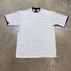 "excellent vintage condition. appears unworn. two identical tee available at time of listing. please refer to approximate measurements (flat) below - may not fit as tagged pit to pit - 22\" collar to hem - 27\" if you have any questions, please ask." Stitch T Shirt, White Undershirt, Made In Usa, Adult Outfits, Tops & Tees, T-shirt, Top Outfits, Mens Outfits, Mens Graphic Tshirt