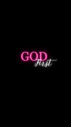 the words god first are lit up in pink and white on a black background with a neon