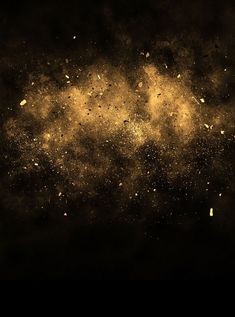 an image of gold dust in the dark