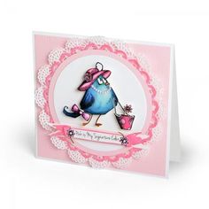 a pink and white card with a blue bird on it's side, holding a flower pot