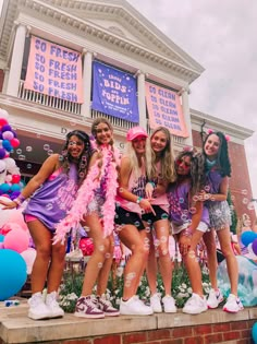 the girls are all dressed up and having fun