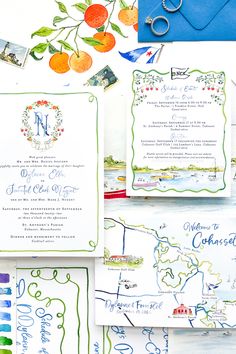 the wedding stationery is laid out on top of each other