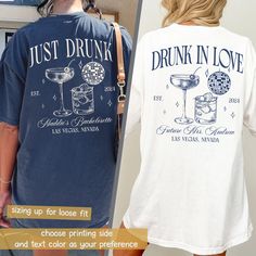 two women wearing t - shirts that say just drink in love