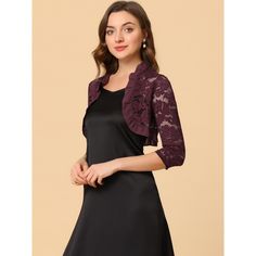 The ruffle collar, sheer floral lace fabric, and crop length give a unique, elegant touch. This cardigan shrug is perfect for layering over your favorite dresses or tops. It adds the right amount of coverage without taking away from the overall style of your outfit. If you're looking for a versatile and stylish piece to add to your wardrobe, the Women's Elegant Ruffle Collar Crop Cardigan Sheer Floral Lace Shrug Top is the perfect choice. It's a timeless piece that you can wear season after seas Spring Party Shrug With Lace Trim, Evening Fitted Shrug With Lace Sleeves, Party Lace Shrug With Lace Sleeves, Fitted Lace Trim Party Shrug, Elegant Lace Shrug With Lace Trim, Crop Shrug, Short Sleeve Bolero, Shrug Top, Cardigan Shrug