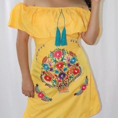 Handmade In Chiapas, Mexico The Embroidery Pattern & Colors Will Vary Due To The Handmade Nature Of The Dress. More Colors Available. The Dress Ties In The Back. Size Medium Measurements (Approximate): Length: 31 -32 Inches Armpit To Armpit: 21 Inches Size Large Measurements (Approximate): Length: 31 -32 Inches Armpit To Armpit: 22.5 Inches Size Xl Measurements (Approximate): Length: 34 Inches Armpit To Armpit: 25 Inches Material: Poplin Cotton Blend Bohemian Embroidered Dress For Summer, Bohemian Summer Embroidered Dress, Yellow Floral Embroidered Dress, Summer Folk Style Embroidered Fabric, Summer Festival Floral Embroidered Fabric, Traditional Yellow Floral Embroidered Dress, Traditional Yellow Embroidered Dress With Floral Embroidery, Traditional Yellow Embroidered Dress With Floral Design, Bohemian Floral Embroidered Fabric For Summer