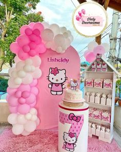 a hello kitty themed birthday party with balloons