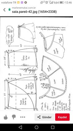 the sewing pattern is shown on an iphone screen, and it appears to be made from paper