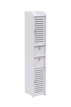 a tall white cabinet with three drawers