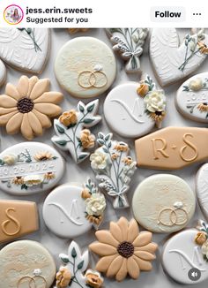 cookies decorated with wedding rings and flowers are displayed on the screen for an instagram