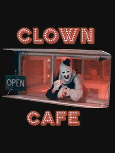 the clown is sitting in front of an open cafe window with neon words above it