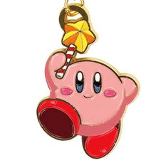 a pink pig keychain with a yellow umbrella hanging from it's back