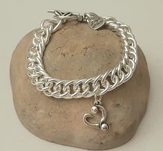 silver bracelet for woman very unique chain double curb link heart charm silver plated good quality all sizes easy to wear it Trendy Silver Double Heart Jewelry, Trendy Silver Heart Bracelet For Everyday, Everyday Silver Metal Heart Bracelet, Trendy Silver Bracelets With Heart Charm, Trendy Sterling Silver Double Heart Jewelry, Trendy Double Heart Sterling Silver Jewelry, Trendy Handmade Silver Chain Bracelet, Trendy Silver Heart Bracelet With Adjustable Chain, Trendy Sterling Silver Heart Bracelet