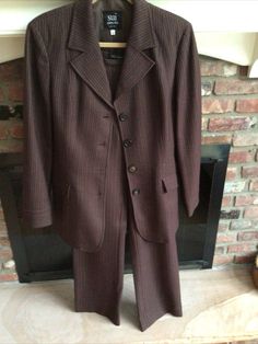 SUI ANNA SUI Brown Pinstriped WOOL Blend 2 PC PANTSUIT Sz 44(8/10)US. This is a beautifully tailored suit!! Very flattering. condition is like new. Even the pocket slits are intact. The jacket tapers in on the waist and the pants stretch to fit perfectly. If this is your size and you wear suits you will love this one. I wish I was still working. Pit to pit it measures 19” jacket waist 16” below pocket hip 20”.shoulder to shoulder 16.5 shoulder to hem 25.5 length 30”. Pant is high waist and measu Fall Office Pinstripe Suits, Fall Pinstripe Office Suits, Striped Notch Lapel Business Sets, Business Striped Notch Lapel Sets, Striped Business Sets, Formal Striped Fall Suit, Formal Striped Suit For Fall, Fall Striped Formal Suit, Striped Business Suits For Fall