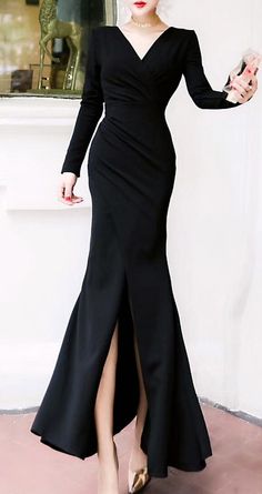 Elegant V neck Black Aesthetic Long Sleeve High Center Slit Mermaid Formal Dress. This black long dress maxi is made of a beautiful soft stretchable fabric. This black long dress maxi will make you look very elegant and feminine. The features of this long dress maxi are the following: black color, bodycon tight fitted, dress maxi (long size), with long sleeves, soft stretchable fabric, side slit, thigh split. Long Sleeve V Neck Dress Formal, Black Long Cocktail Dress, Black Winter Dress Formal, Long Tight Dresses Casual, Elegant Black Dress Classy Long, Black Elegant Dress Long, Black Formal Dress Long Classy, Black Formal Dress Long, Black Dress Classy Elegant Long