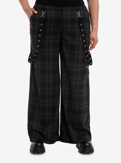 Amp up your punk outfit with these baggy  wide leg trouser pants! They have an allover black and brown plaid design and come with removable grommet suspender straps. Complete with front  back and cargo pockets.Please note: Style is fitted with no stretch; size up for a looser fit.78% polyester; 20% rayon; 2% spandexWash cold; dry flatRise: 14''Inseam: 33''ImportedModel is 5'10''Model wears size 1 Brown Grunge Bottoms For Fall, Edgy Brown Bottoms For Fall, Punk Bottoms With Belt Loops For Fall, Punk Style Bottoms With Belt Loops For Fall, Gothic Pants With Pockets For Fall, Gothic Bottoms With Pockets For Fall, Grunge Bottoms With Belt Loops For Fall, Gothic Fall Pants With Pockets, Fall Gothic Pants With Pockets