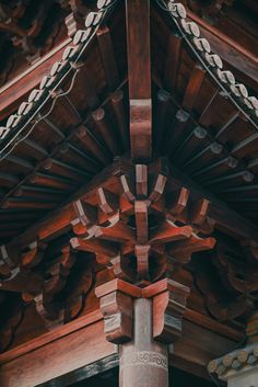 an ornate wooden structure with decorative carvings on it