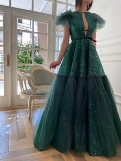 Lace Ball Gown With Tulle Skirt For Party, A-line Tulle Ball Gown For Party, Green Tulle Evening Gown, Green Tulle Dress For Gala, Green Embellished Tulle Ball Gown, Evening Ball Gown With Sequins And Tulle, Elegant Green Organza Ball Gown, Embellished Green Tulle Ball Gown, Elegant Floor-length Glitter Tulle Evening Dress