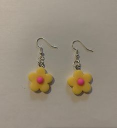 These handmade flower earrings are so cute and go with anything! Dangle Flower Earrings With 3d Flowers For Gifts, Gift Flower Dangle Earrings With 3d Flowers, Cute Flower-shaped Pierced Earrings, Cute Adjustable Flower Charm Earrings, Cute Flower Shaped Earrings With Ear Wire, Cute Pink Flower Earrings With Ear Wire, Playful Handmade Flower Earrings, Fun Pink Flower Earrings, Trendy Flower Earrings