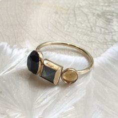 Top of the world This is a pretty 14K gold filled mothers ring. The band is set with three birthstones, in three sizes, Oval, square and round by choice or with the stones on the picture Onyx, labradorite and citrine. (R2613) For more info about gold filled please check our profile. Construction & Dimensions: 14K yellow gold filled, Onyx, labradorite and citrine. Approximate band width: 2.5mm please indicate your requested size in the order. About our jewelry All of artisanfield jewelry coll Unique Gold Rings With Birthstone, Gold Topaz Ring With Gemstone, Unique Gemstone Rings In 14k Gold, Unique 14k Gold Gemstone Rings, Unique 14k Gold Birthstone Ring, Unique 14k Gold Rings With Gemstone, Gold Three Stone Birthstone Ring In Fine Jewelry Style, Unique Yellow Gold Birthstone Ring With Ethical Gemstones, Unique 14k Gold Rings With Accent Stones