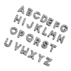 the letters and numbers are made out of silver metal with diamonds on them, as well as