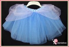 a blue tutu skirt with a bow on it