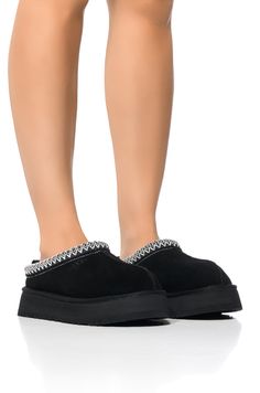 Coupon codes and promotions do not apply to this item.  Take comfort to the next level with the UGG Tazz Flat in Black! These cozy slipper-like shoes feature a smooth suede upper, upcycled wool lining, a slip-on fit, and a woven ankle band accent. Complete with contrast stitching, a pull back ankle tab, and an embossed UGG logo front detail. Complete with a textured platform sole.  Fit and details (approx. measured from a women’s size 8):  - Suede upper - Rounded toe - Platform sole - 1.5” platform sole height - Imported  Product ID: 393370 Ugg Tazz, All White Party, Flat Slipper, White Accessories, Slippers Cozy, White Party, White Outfits, Pull Tab, White Shoes