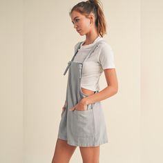 This Is A Super Comfy Romper Jumpsuit. The Tied Sleeves Are Adjustable. This "Harbor" Romper Flaunts Effortless, Relaxed Style. Its Tied Sleeves And Large Pockets Offer Comfort And Convenience. Crafted From Lightweight, Breathable Fabric Denim Romper Outfit, Light Blue Romper, Comfy Romper, Flowy Romper, Loose Jumpsuit, Romper Jumpsuit, Blue Romper, Romper Outfit, Denim Romper