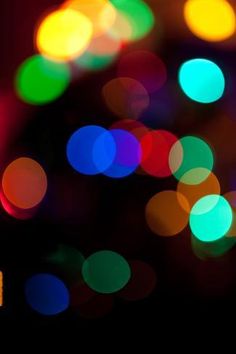 an image of colorful lights in the dark canvas wall art print on wrapped canvas, ready to hang