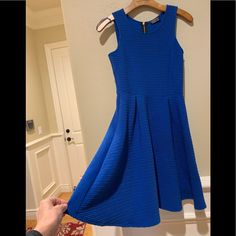 Designed By Stitch Fix. This Dress Is Beautifully Made With A Flare Skirt.Zipper In Back. Sleeveless. Never Worn. Perfect Condition. Beautiful Cobalt Blue. Blue Mini Dress With Zipper Closure, Casual Blue Dress With Zipper Closure, Blue Spring Dresses With Back Zipper, Spring Blue Dresses With Back Zipper, Blue Dresses With Side Zipper, Blue Knee-length Dresses With Side Zipper, Blue Stretch Mini Dress With Back Zipper, Blue Sleeveless Dress With Side Zipper, Blue Summer Dress With Zipper Closure