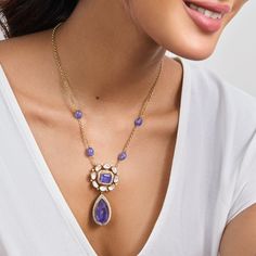 Description: Introducing our exquisite pendant necklace, a true embodiment of elegance and grace. At its center, a captivating amethyst-colored stone is encircled by shimmering moissanites and zircons, creating a stunning focal point. Below, a beautiful drop stone hangs delicately, adding a touch of sophistication and allure to the design. This necklace is a timeless masterpiece, perfect for adding a dash of glamour to any outfit. Elevate your style with this enchanting pendant necklace, sure to Luxury Silver Gemstone Temple Necklace, Semi Precious Stone Necklace, Jewellery Designing, Ethereal Jewelry, Gold Temple Jewellery, Silver Pooja Items, Designer Diamond Jewellery, Edgy Jewelry, Victorian Pendants