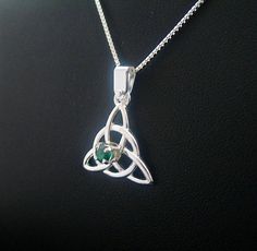 Irish Celtic Charmed Necklace Emerald Irish Necklace by Camias Green Sterling Silver Pendant Birthstone Necklace, Green Sterling Silver Birthstone Pendant Necklace, Green Pendant Birthstone Necklace In Sterling Silver, Symbolic Green Gemstone Jewelry, Green Symbolic Sterling Silver Jewelry, Symbolic Green Sterling Silver Jewelry, Spiritual Sterling Silver Jewelry For May Birthstone, Spiritual Sterling Silver Necklace For May Birthstone, Silver Pendant Birthstone Necklace With Natural Stones