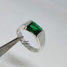 BAND - ROUNAK JEWELLERS MATERIAL - 925 STERLING SILVER GEMSTONE - LAB CARTED EMERALD EMERALD STONE WEIGHT - 2.20 CT, EMERALD STONE SIZE - 7 x 9 MM GROSS WEIGHT - 7.160 GM STONE SHAPE - EMERALD GEM COLOUR - GREEN RING SIZE- ALL SIZE AVAILABLE PLEASE GIVE YOUR OPENION OR FEEDBACK ABOUT THE PRODUCT. WE ACCEPT BULK ORDER ALSO. https://www.etsy.com/in-en/shop/RounakJewellers?ref=search_shop_redirect Silver Ring With Green Stone, Silver Ring Green Stone, Sterling Silver Rings With Bezel Setting And Emerald Cut, Modern Sterling Silver Green Rings, Modern Sterling Silver Solitaire Rings, Sterling Silver Solitaire Signet Ring For Promise, Modern Green Sterling Silver Rings, Sterling Silver Emerald Cut Rings Stamped 925, Emerald Cut Sterling Silver Signet Ring For Anniversary