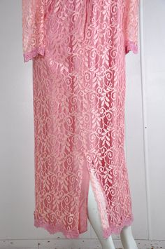 "A darling pink lace dress by JC Penney circa the 60s / 70s. It has little snaps at the sleeves, nape, and bust. There's a back zipper closure with a natural opening in the lace fabric to allow for the zipper to move. Made in the USA. Would suit a small or petite medium, but please see measurements below for accurate fit. CONDITION: Great gently worn condition. No flaws to note. MEASUREMENTS Bust: 38\" Waist: 30\" Length: 51\" Have a question? Please ask me anything." Pink Lace Dress With Lace Patchwork, Pink Spring Lace Dress With Delicate Details, Feminine Pink Dress With Delicate Lace, Pink Delicate Lace Dress For Spring, Spring Pink Delicate Lace Dress, Feminine Pink Delicate Lace Dress, Pink Fitted Lace Dress With Lace Sleeves, Fitted Pink Lace Dress With Lace Sleeves, Fitted Pink Lace Dress With Delicate Details