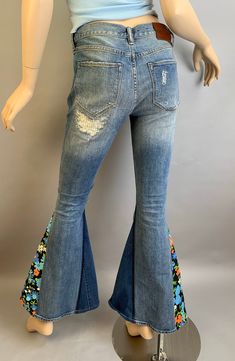 Vintage 70s style up-cycled Allsaints jeans with vintage fabric gussets added. Distressed vintage look denim jeans size 26 low waist tight fit jeans. True waist 26 Low waist 29 Hip 32 Inseam 31 inches Rise 8 Waist to hem 39 Unique Bell Bottom Jeans, Low Waisted Bell Bottom Jeans, Bell Bottom Jeans With Fabric Insert, 1970s Denim Bottoms, 1970s Fitted Denim Bottoms, 70s Blouse, Kimono Sleeve Top, 80s Prom Dress, 70s Vintage Fashion