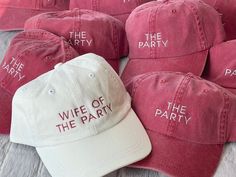 six red and white hats with the words wife of the party written on one side