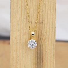 1 CT Round Moissanite Pendant / Solitaire Diamond 10K Yellow Gold Pendant / Birthday Gift for Her / Delicate Simple Necklace / Bridesmaid Gift / Moissanite Diamond Pendant / Solitaire Diamond Pendant / Anniversary Gift For Your Girlfriend / Moissanite Wedding Pendant / Bridal Pendant / Yellow Gold Solitaire Pendant / Proposal Gift / Simple Single Stone Pendant / Graduation Gift ✥ SKU No.: IBJ8437 ✥ 𝐒𝐭𝐨𝐧𝐞 𝐃𝐞𝐭𝐚𝐢𝐥𝐬: ➻ Shape: Round ➻ Weight: 1.00 CT ➻ Size: 6.50 MM ➻ Color: Colorless ➻ C Yellow Gold Moissanite Solitaire Necklace For Wedding, Yellow Gold Moissanite Solitaire Necklace For Anniversary, Anniversary Yellow Gold Moissanite Solitaire Necklace, Gold Solitaire Moissanite Necklace, Wedding Solitaire Necklace In 14k Gold With Prong Setting, Diamond White Solitaire Necklace With Birthstone For Wedding, Wedding Solitaire Necklace With Birthstone In Diamond White, Gold Moissanite Solitaire Necklace For Anniversary, Gold Solitaire Necklace With Prong Setting For Wedding