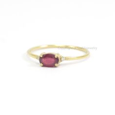 Ruby Diamond Ring / 14k Solid Gold Minimalist Ruby Ring / Stacking Ruby Ring / Jewelry / ≫ Features * Items Code: SGR00342 * Diamond: 100% Genuine Diamond * Diamond Wt: 0.03 ct * Diamond Color: G-H * Diamond Clarity: S2-SI1 * Diamonds Cut: Brilliant Cut (Excellent Cut) * Metal: 14K Solid Gold (18K also available - Additional fees may apply) * Gold wt: 1.25 gm * Ruby : 0.18 mm * More option in gold color: Rose gold, yellow gold, White gold * Ring Size: 3 to 9 1.2 mm band ≫ FAQ below for more deta Minimalist Oval Cabochon Wedding Jewelry, Minimalist Oval Cabochon Wedding Ring, Dainty Oval Birthstone Ring, Elegant Oval Ruby Stackable Ring, Minimalist 14k Gold Oval Cabochon Jewelry, Dainty Oval Stackable Birthstone Ring, Dainty Oval Cabochon Wedding Ring, Delicate Oval Stackable Rings, Delicate Stackable Oval Rings