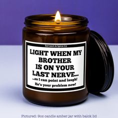 a candle with a label on it that says, light when my brother is on your last neve