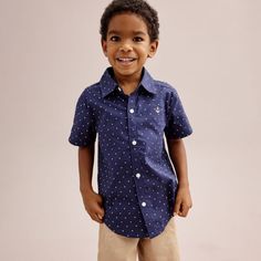 He'll look and feel his very best in this Toddler Boy Carter's 2-Piece Polka-Dot Button Down Shirt & Shorts Set. He'll look and feel his very best in this Toddler Boy Carter's 2-Piece Polka-Dot Button Down Shirt & Shorts Set. FEATURES 2-piece set includes: button-down shirt & pull-on shorts Button-down shirt: button front, short sleeves, allover print Pull-on shorts: elastic waistband, non-functional fly, non-functional pocketsFABRIC & CARE 100% cotton Machine wash ImportedRESPONSIBLE Tested for Fitted Casual Shirt For Playtime, Toddler Boy Photoshoot Outfits, Casual Short Sleeve Sets With Button Closure, Casual Playtime Sets With Buttons, Casual Blue Sets With Buttons, Casual Tops With Buttons For Playwear, Cotton Short Sleeve Set With Button Closure, Spring Toddler Boy Outfits, Boy Vacation Outfits