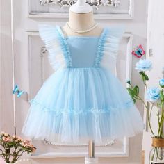 Light Blue Colored Ruffle Dress. Never Used, Still In Packaging. Will Negotiate. Just Want To Clear Out Sleeveless Blue Tutu Dress For Dress-up, Light Blue Tutu Dress For Summer Dress-up, Playful Ruffled Tutu Dress For Dress-up, Summer Princess Dress With Ruffles For Dress-up, Summer Princess Ruffle Dress, Light Blue Ruffled Tutu Dress For Party, Spring Princess Dress With Ruffles For First Birthday, Princess Style Ruffle Dress For Summer, Light Blue Princess Dress With Ruffles