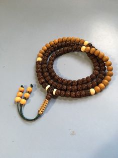 Old Rudraksha Mala Necklace with Sandalwood and Bone. Laid out iin a Zen sequence with an adjustable knot. Great for meditation mindfulness Mens Mala Necklace, Wood Necklace Men, Rudraksha Bracelet, Buddhist Necklace, Make A Necklace, Rudraksha Mala, Rudraksha Beads, Long Necklace Boho, Mala Bead Necklace