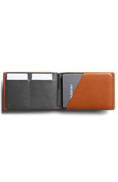 A spacious, well-organized interior means easy convenience for this travel-ready wallet that comes equipped with a micro-pen. Features like RFID shielding and a hidden cash compartment help protect you and your personal information on the road. Interior pen loop; passport compartment; slip pockets; four card slots Leather Imported Travel Wallet, Energy Use, Travel Wallets, Leather Working, On The Road, The Road, Card Slots, Slots, Caramel