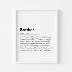 a white framed print with the words brother in black on it's front and back