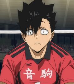 an anime character with black hair and blue eyes wearing a red shirt, staring at the camera