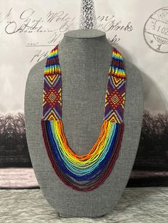 Beautiful set of handmade jewelry made with beads by Mexican artisans. Multicolor Beaded Bib Necklace As Gift, Bohemian Bib Necklace With Polished Beads As Gift, Multicolor Bib Necklace With Polished Beads For Gift, Multicolor Dangling Beads For Gifts, Multicolor Jewelry With Beaded Chain, Rainbow Jewelry With Large Beads For Jewelry Making, Handmade Rainbow Multi-strand Necklace, Multicolor Spacer Beads Jewelry For Crafting, Multicolor Polished Beaded Earrings As Gift