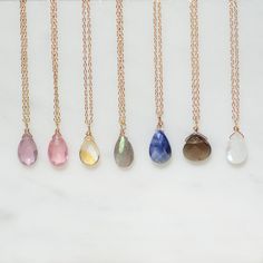 Stunning one-of-a-kind gemstone briolette drop on chain! This is the perfect pop of color that goes with any outfit. Each necklace has a genuine gemstone on an 18-inch chain with an adjustable slider, meaning it can shortened to any length. Sterling silver base with 14k gold plating. Select your favorite gemstone: Pink Sapphire: promotes good fortune, power, and strength Citrine Yellow: strengthens self-esteem and positivity Labradorite: brings forth perseverance and strengthens intuition Mystic Professional Jewelry, Jewelry Cleaner, Smoky Quartz, Cleaning Jewelry, Gold Plated Jewelry, Jewelry Plate, Pink Sapphire, Gemstone Colors, Self Esteem