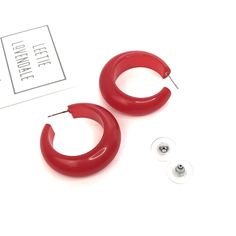 ruby red hoops Trendy Small Red Hoop Earrings, Trendy Small Hoop Red Earrings, Trendy Red Plastic Jewelry, Trendy Red Hoop Earrings, Trendy Red Plastic Earrings, Modern Small Red Hoop Earrings, Modern Red Small Hoop Earrings, Affordable Quirky Red Earrings, Trendy Red Resin Earrings