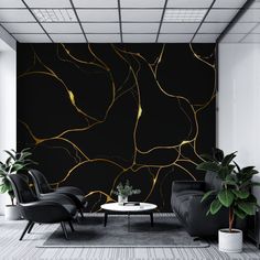 a living room with black and gold wallpaper, two chairs and a coffee table