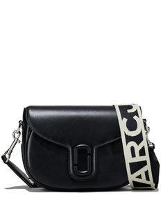 black calf leather logo plaque foldover top with magnetic fastening internal zip-fastening pocket logo shoulder strap Marc Jacobs Logo, Marc Jacobs Handbag, Shoulder Strap Bag, Marc Jacobs Bag, Medium Tote, Spring 2023, Black Crossbody, Black Queen, Saddle Bag